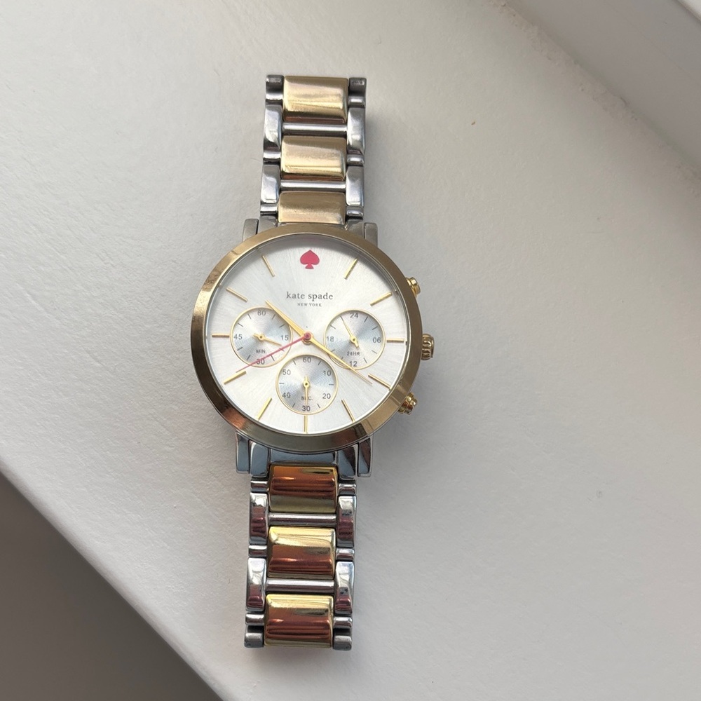 kate spade women’s two tone stainless steel watch with pearl face.